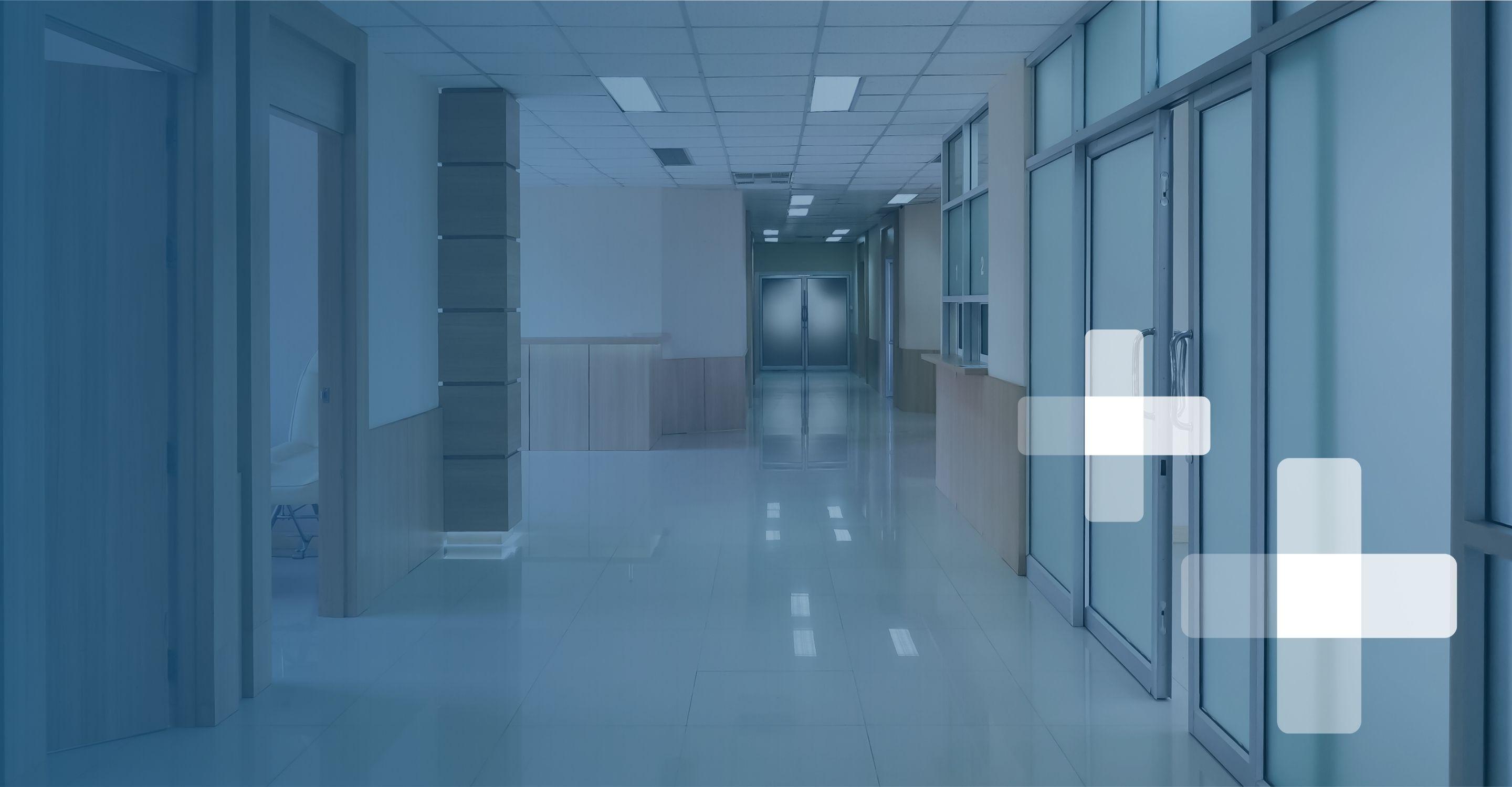 A long empty hallway at a clean, modern healthcare facility